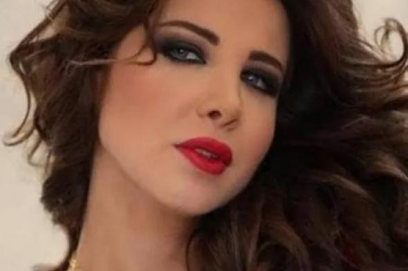 شوف دلوقتي ..شقيقة الفنانة نانسي عجرم (نادين)تخطف الأنظار بجمالها الصارخ والغير متصور في أول ظهور لها !! (صورة )