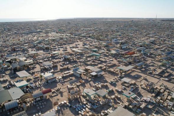 انفجار قنبلة داخل مقبرة في النجف العراقية (صور)